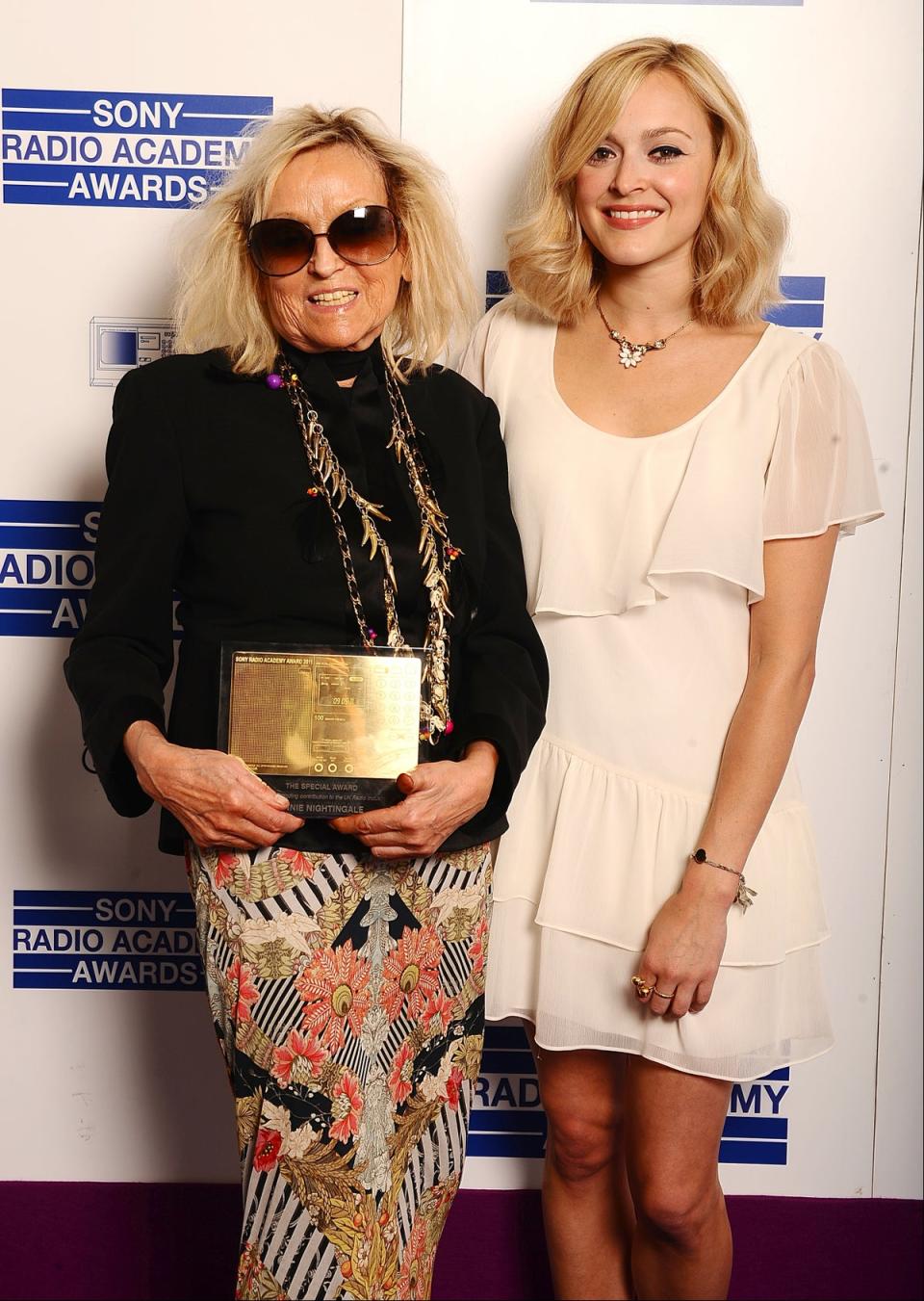 Nightingale and fellow broadcaster Fearne Cotton with the Special Award, at the Sony Radio Academy Awards in 2011 (PA)