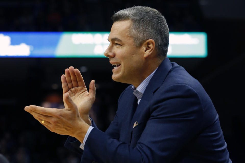 FILE - Virginia head coach Tony Bennett directs his team during the first half of an NCAA college basketball game against Virginia Tech in Charlottesville, Va., in this Saturday, Jan. 4, 2020, file photo. Virginia will begin the college basketball season at No. 4 in the preseason AP Top 25 poll released Monday, Nov. 9, 2020.(AP Photo/Steve Helber, File)