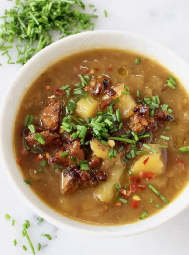 <p><a href="https://veggiesociety.com/simple-cabbage-potato-soup-recipe-vegan/" rel="nofollow noopener" target="_blank" data-ylk="slk:Veggie Society;elm:context_link;itc:0;sec:content-canvas" class="link ">Veggie Society</a></p>