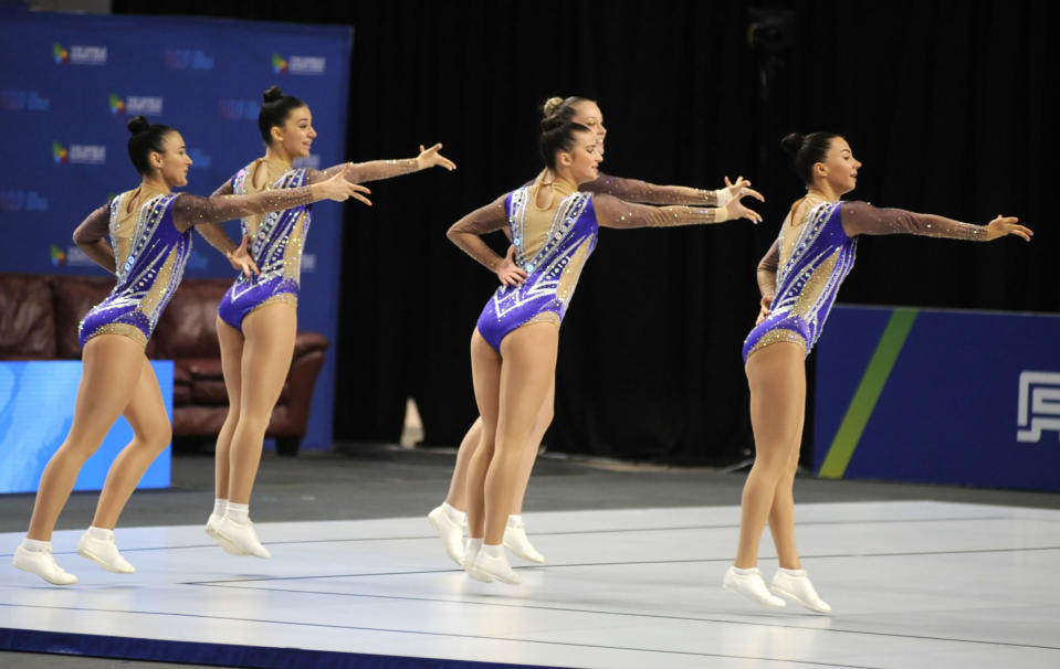 Members of the Ukrainian aerobic gymnastics team compete during The World Games in Birmingham, Ala., on Wednesday, July 13, 2022. The 11-day, Olympic-style competition is being held in the United States for only the second time, at venues throughout Birmingham, Ala. (AP Photo/Jay Reeves)