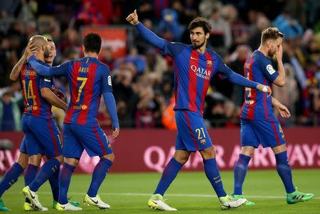 Football Soccer- Spanish La Liga Santander - Barcelona v Osasuna - Camp Nou stadium, Barcelona, Spain - 26/04/17 Barcelona's Andre Gomes celebrates a goal. REUTERS/Albert Gea