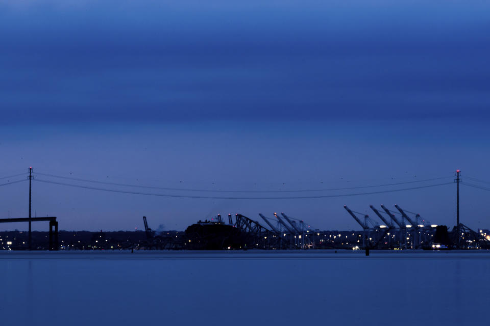 Wreckage of the Francis Scott Key Bridge rests on the container ship Dali, Sunday, March 31, 2024, in Baltimore. (AP Photo/Julia Nikhinson)