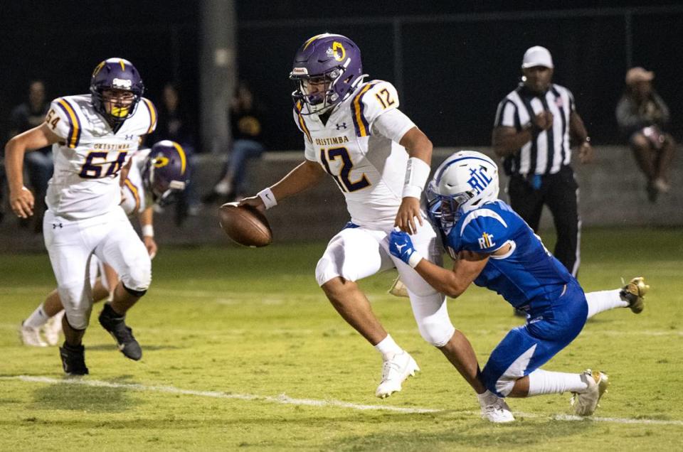 Ripon Christian’s Trevor Van Elderen tracks down Orestimba quarterback Jacob Valenzuela during the Southern League game in Ripon, Calif., Friday, Sept. 22, 2023.