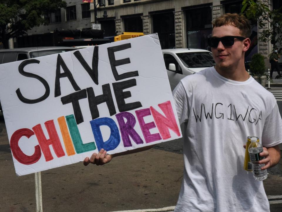 qanon save the children sign trump