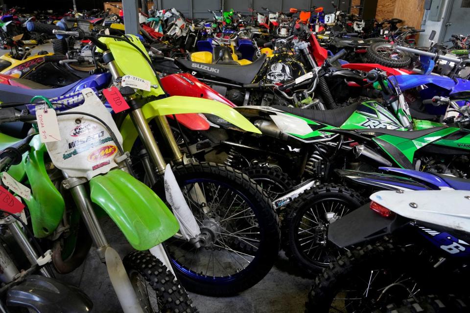 A warehouse where Providence police impound confiscated illegal vehicles. [Kris Craig/Providence Journal]