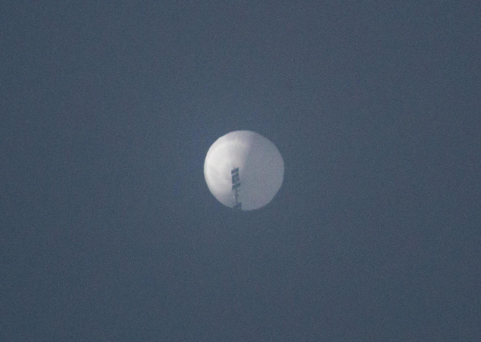 A balloon flies in the sky over Billings, Montana, on February 1, 2023, in this picture obtained from social media. / Credit: Chase Doak via Reuters