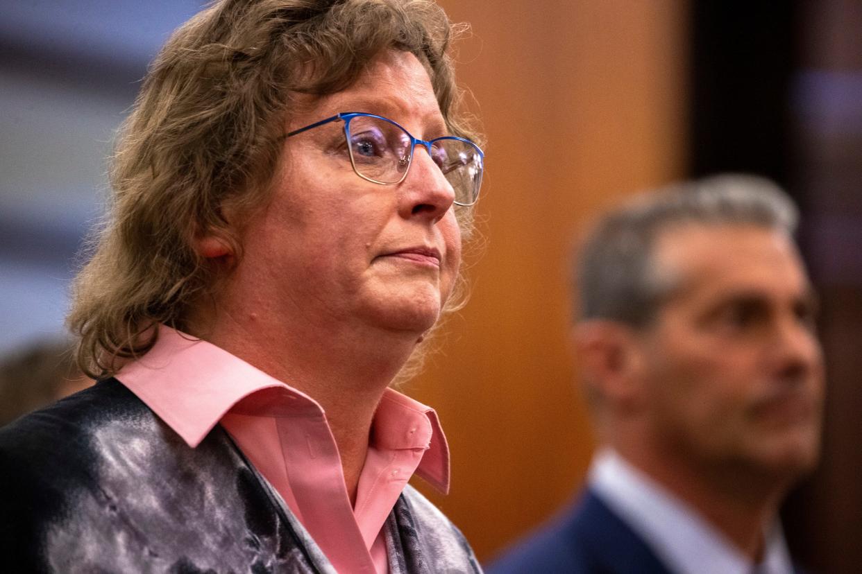 Ginger Hadwin, the sister of Gloria Satterfield, reads a letter to Alex Murdaugh during Murdaugh's sentencing for stealing from 18 clients, Tuesday, Nov. 28, 2023, at the Beaufort County Courthouse in Beaufort, S.C. (Andrew J. Whitaker/The Post And Courier via AP, Pool)