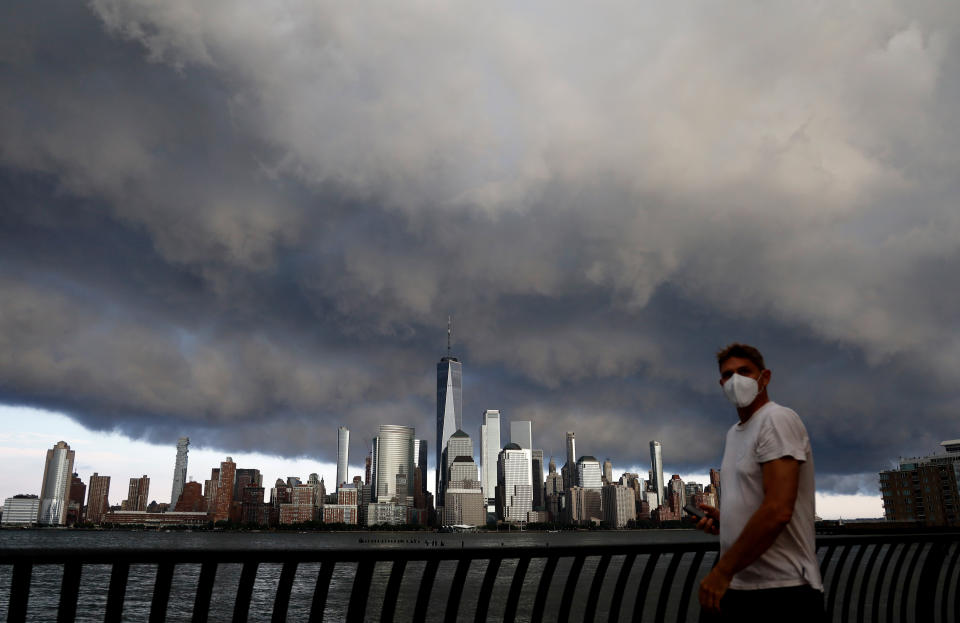 A thunderstorm passes over the skyline of lower Manhattan. (Photo: Gary Hershorn via Getty Images)