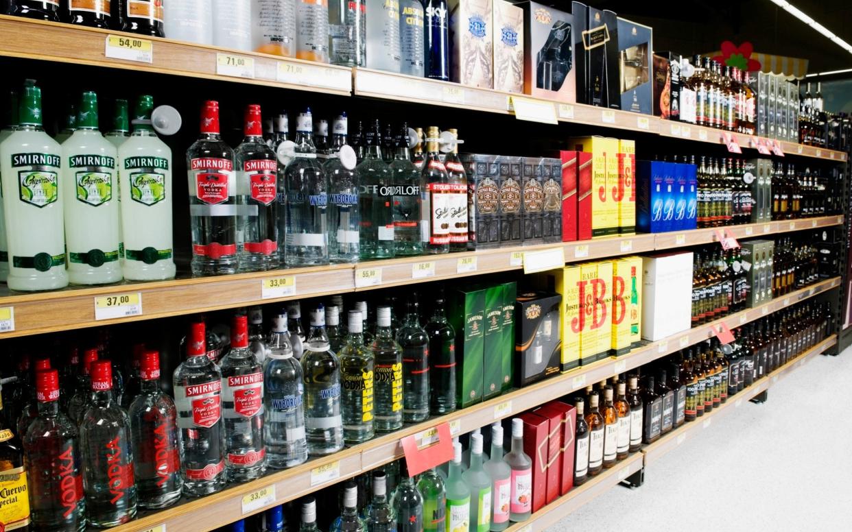 Alcohol - Bottles arranged in a liquor store