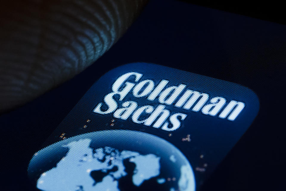 BERLIN, GERMANY - JANUARY 02: In this photo illustration the logo of American multinational investment bank and financial services company The Goldman Sachs Group, Inc. is displayed on a smartphone on January 02, 2019 in Berlin, Germany. (Photo Illustration by Thomas Trutschel/Photothek via Getty Images)