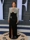 <p>The<em> Black-ish</em> star looked regal in her silver and black dress. (Photo: JEAN-BAPTISTE LACROIX/AFP/Getty Images) </p>