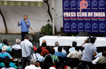 FILE PHOTO: Ravish Kumar, journalist and senior executive editor at NDTV, addresses a group of journalists at the Press Club of India in New Delhi, April 3, 2018. REUTERS/Saumya Khandelwal/File Photo