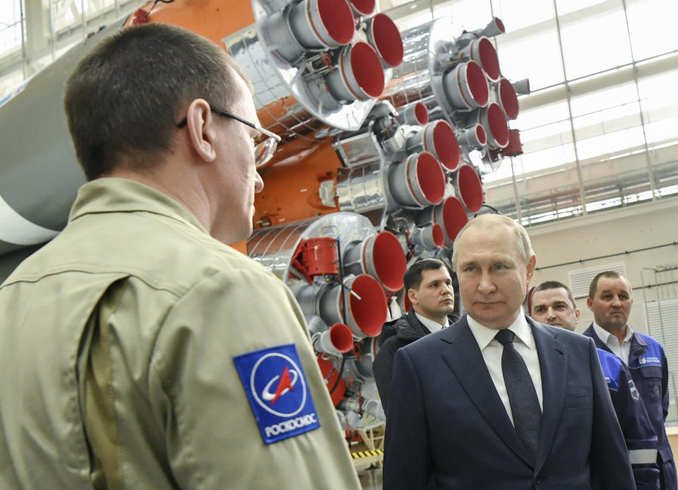 Russian President Vladimir Putin speaks with Roscosmos space agency employees at a rocket assembly factory during his visit to the Vostochny cosmodrome outside the city of Tsiolkovsky, about 200 kilometers (125 miles) from the city of Blagoveshchensk in the far eastern Amur region Tsiolkovsky , Russia, Tuesday, April 12, 2022. Russia on Tuesday marks the 61th anniversary of Gagarin's pioneering mission on April 12 1961, the first human flight to orbit that opened the space era. (Evgeny Biyatov, Sputnik, Kremlin Pool Photo via AP)