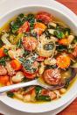 <p>A good, hearty <a href="https://www.delish.com/uk/cooking/recipes/g28794441/vegetable-soup/" rel="nofollow noopener" target="_blank" data-ylk="slk:soup;elm:context_link;itc:0;sec:content-canvas" class="link ">soup</a> is one of our favourite ways to warm up in the colder months. And this Slow Cooker Sausage and White Bean Soup will do that perfectly.</p><p>Get the <a href="https://www.delish.com/uk/cooking/recipes/a29794477/slow-cooker-sausage-and-white-bean-soup-recipe/" rel="nofollow noopener" target="_blank" data-ylk="slk:Slow Cooker Sausage and White Bean Soup;elm:context_link;itc:0;sec:content-canvas" class="link ">Slow Cooker Sausage and White Bean Soup</a> recipe.</p>