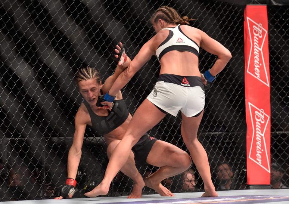 <p>(R-L) Karolina Kowalkiewicz of Poland punches Joanna Jedrzejczyk of Poland in their UFC women’s strawweight championship fight during the UFC 205 event at Madison Square Garden on November 12, 2016 in New York City. (Photo by Brandon Magnus/Zuffa LLC/Zuffa LLC via Getty Images) </p>