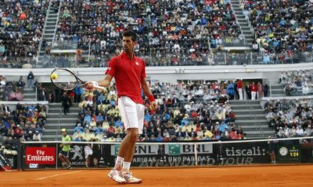 Tennis - Italy Open Men's Singles Final match - Novak Djokovic of Serbia v Andy Murray of Britain - Rome, Italy - 15/5/16 Djokovic reacts. REUTERS/Alessandro Bianchi