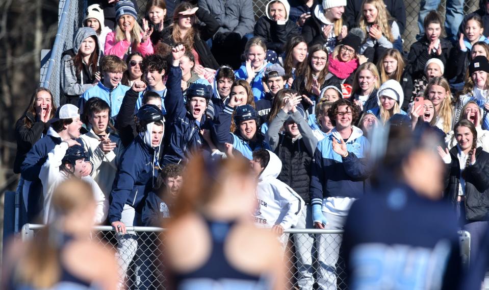 NORWELL 11/19/22  The Sandwich cheering section erupts with applause as their team is introduced.  Sandwich was shut out by Watertown 2-0 in the girls field hockey Div. 3 state final match played at Norwell HS on Saturday. Cape Cod Times/Steve Heaslip