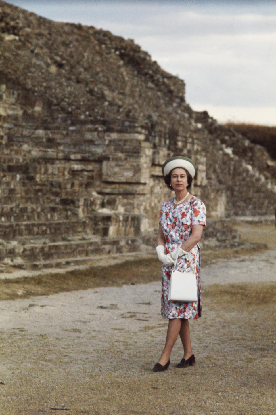 Queen Elizabeth II visits an ancient pyramid during her state visit to Mexico, 1975. (Photo by Serge Lemoine/Getty Images)