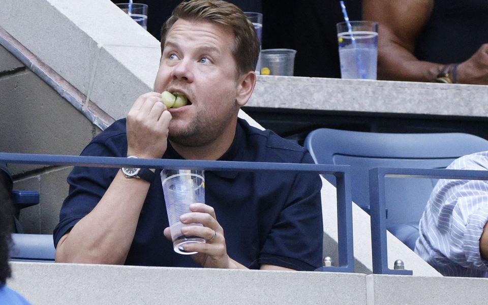 James Corden takes in the action  - Shutterstock