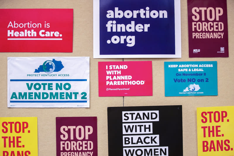 FILE - Signs are tacked to the wall at Protect Kentucky Access' election watch party at the Galt House in Louisville, Ky., Tuesday, Nov. 8, 2022. In Kentucky, a reliably Republican state, voters rejected a GOP-backed ballot measure aimed at denying any state constitutional protections for abortion. Among those voting No were 60% of Catholic voters, according to AP VoteCast. (Ryan C. Hermens/Lexington Herald-Leader via AP, File)