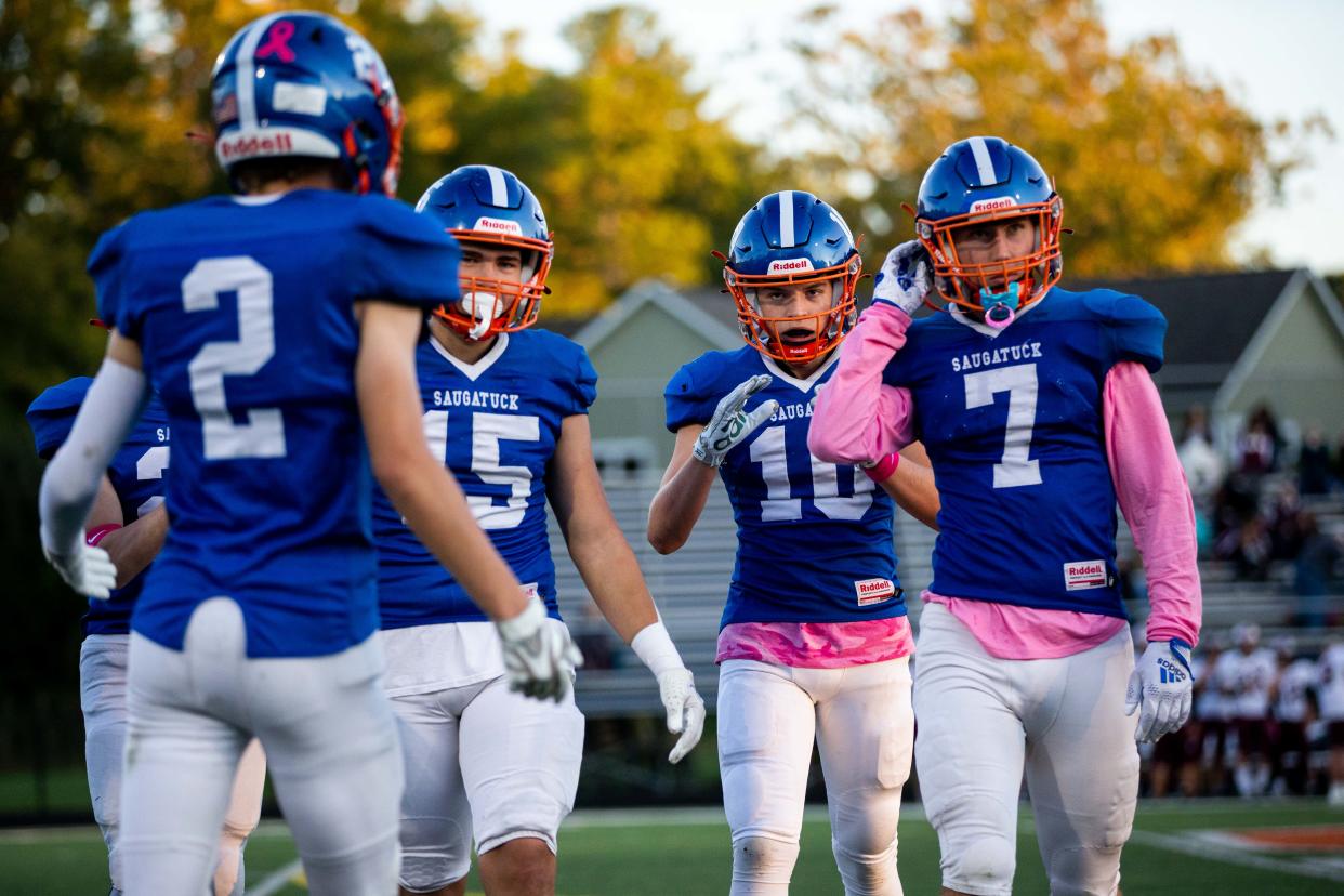 Scenes from Saugatuck's Pink Out game against Delton Kellogg Friday, Sept. 30, 2022, at Saugatuck High School.