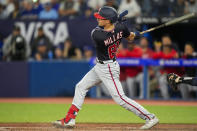 Washington Nationals' Drew Millas takes his first MLB at-bat during ninth-inning baseball game action against the Toronto Blue Jays in Toronto, Monday, Aug. 28, 2023. (Andrew Lahodynskyj/The Canadian Press via AP)