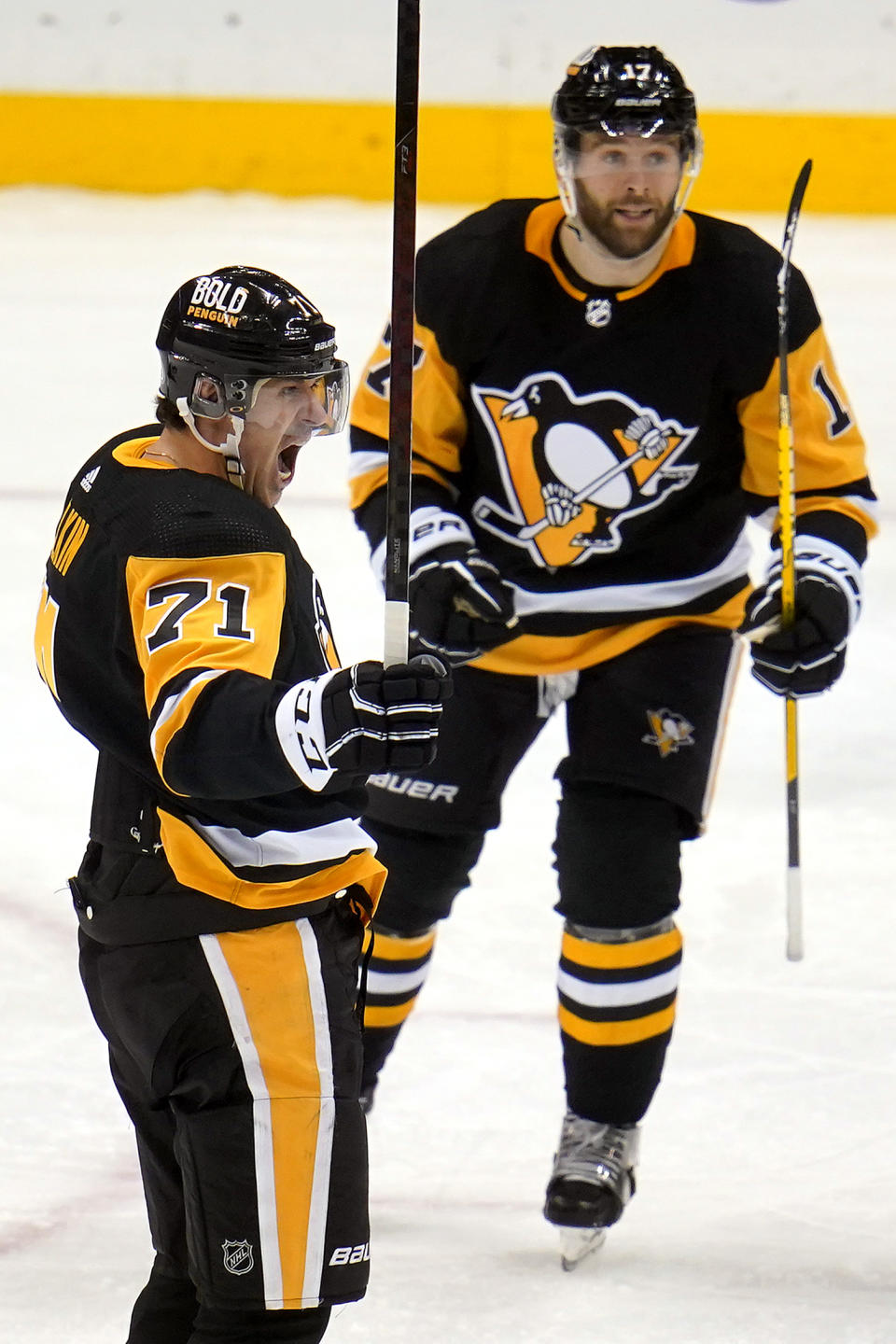 Pittsburgh Penguins' Evgeni Malkin (71) celebrates after scoring during the third period of an NHL hockey game against the Seattle Kraken in Pittsburgh, Thursday, Jan. 27, 2022. The Kraken won in overtime 2-1. (AP Photo/Gene J. Puskar)