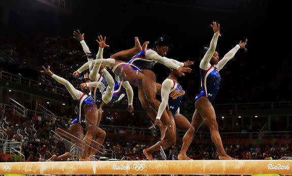 RIO DE JANEIRO, BRAZIL - AUGUST 11: (EDITORS NOTE: Multiple exposures were combined in camera to produce this image.) Simone Biles of the United States competes on the balance beam during the Women's Individual All Around Final on Day 6 of the 2016 Rio Olympics at Rio Olympic Arena on August 11, 2016 in Rio de Janeiro, Brazil.  (Photo by Mike Ehrmann/Getty Images)