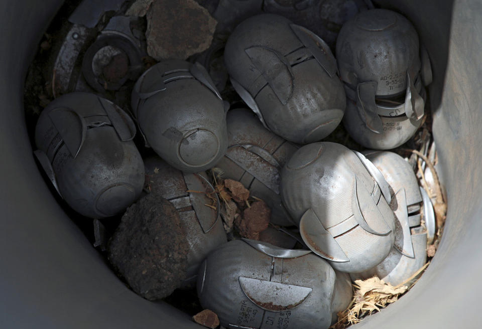 <p>Unexploded cluster bomblets are seen in the rebel-held area in Deraa, Syria July 26, 2017. (Photo: Alaa al-Faqir/Reuters) </p>