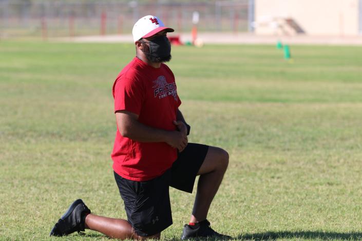 Loving Falcon coach Tyler Finch at a 7:30 a.m. workout session with Falcon athletes at George Frederick Field in Loving, New Mexico June 24.