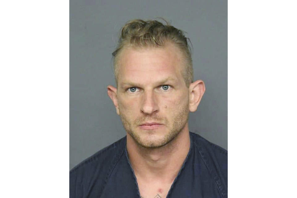 This undated arrest photo released by Denver District Attorney's Office shows Michael R. Close. Close was convicted of using an AK-47 to kill a woman and wound her boyfriend as they walked their dog in Denver and has been sentenced to life in prison. A judge sentenced Close on Friday, Nov. 4, 2022, to a life term without the possibility of parole in the death of 21-year-old Isabella Thallas and added an extra 48-year sentence for the attempted murder of her boyfriend. (Denver District Attorney's Office via AP)