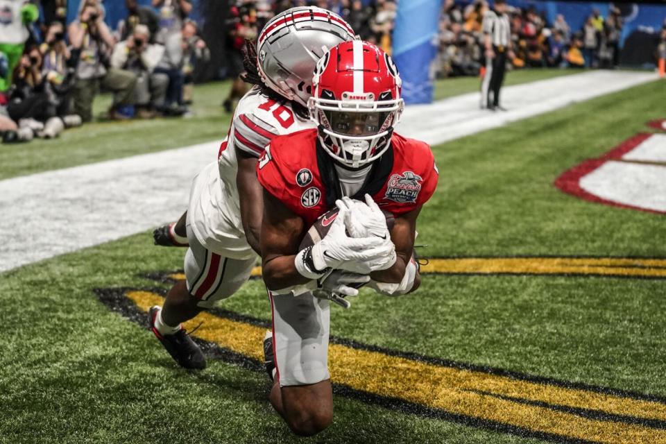 Georgia wide receiver Adonai Mitchell makes a touchdown catch against Ohio State.