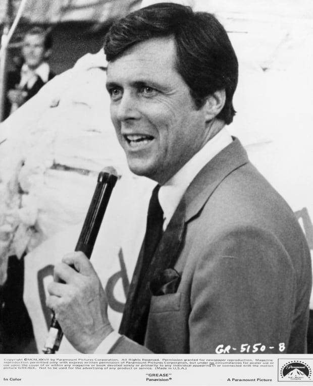 <p><strong> Edd Byrnes</strong> broke hearts as <em>National Bandstand</em> host Vince Fontaine, a sendup of <strong>Dick Clark </strong>and <em>American Bandstand</em>.</p><p><a href="https://www.gettyimages.com/detail/130589043" rel="nofollow noopener" target="_blank" data-ylk="slk:Paramount Pictures/Getty Images;elm:context_link;itc:0;sec:content-canvas" class="link ">Paramount Pictures/Getty Images</a></p>