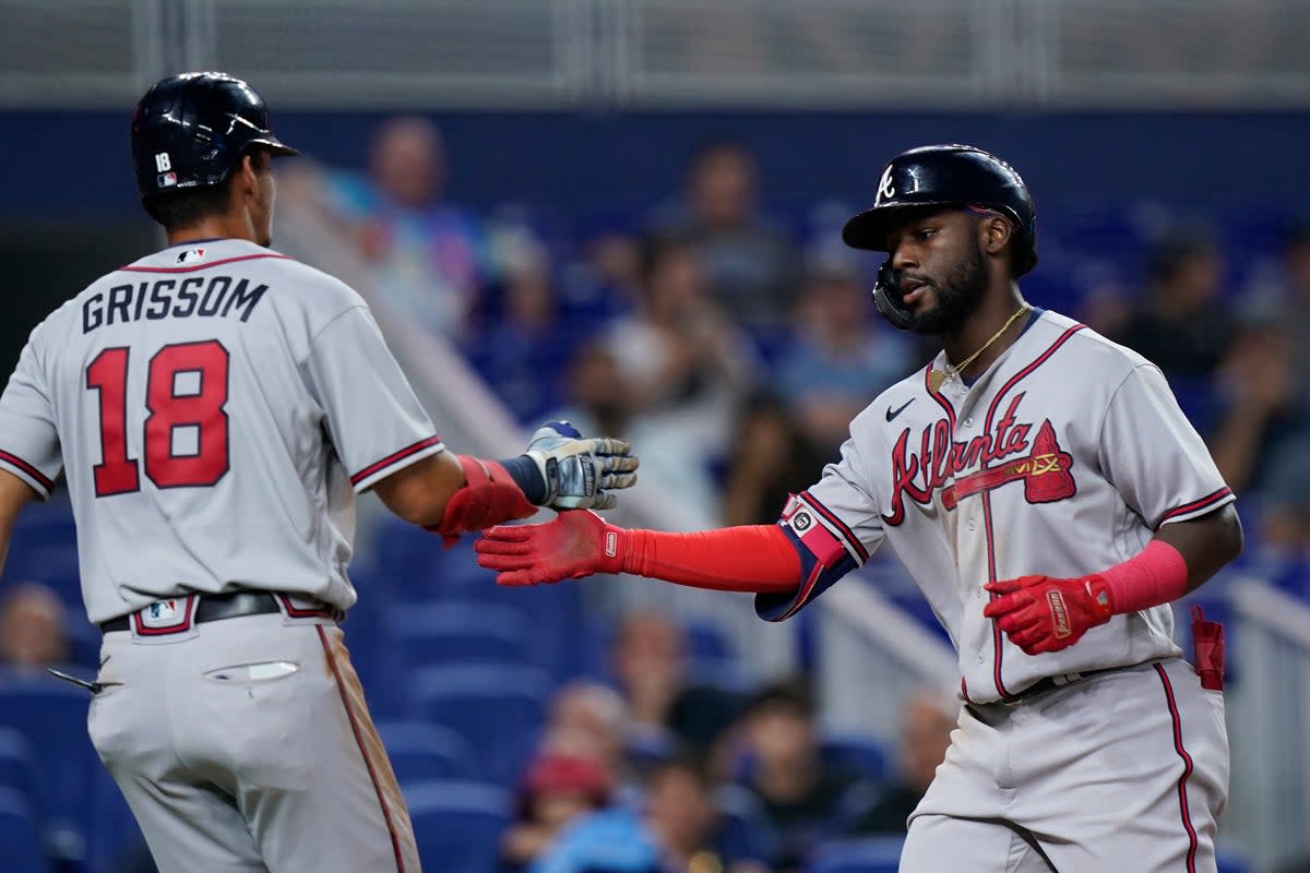 BRAVOS-MARLINS (AP)