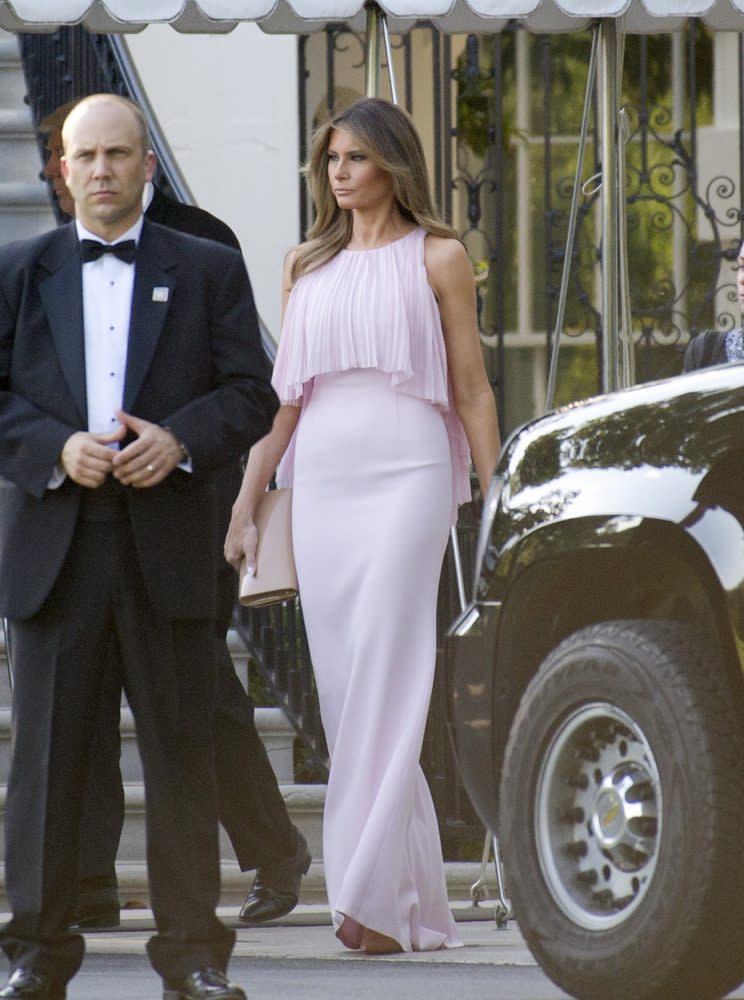 Melania Trump attended Steven Mnuchin’s wedding in a blush evening gown by J.Mendel. (Getty photos)