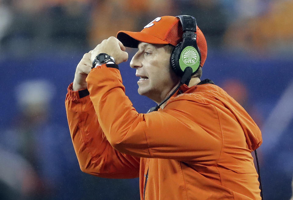 Clemson head coach Dabo Swinney directs his team against Pittsburgh in the first half of the Atlantic Coast Conference championship NCAA college football game in Charlotte, N.C., Saturday, Dec. 1, 2018. (AP Photo/Chuck Burton)