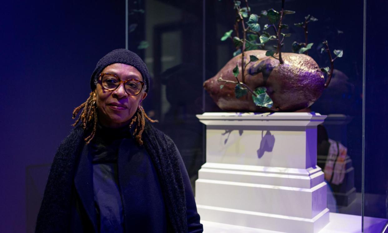<span>Veronica Ryan with a model of her proposed artwork, Sweet Potatoes and Yams are Not the Same.</span><span>Photograph: Aaron Chown/PA</span>