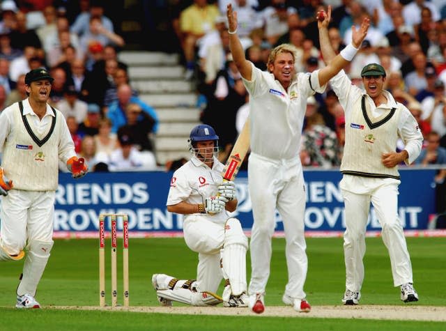 Shane Warne celebrates after dismissing Andrew Strauss in the 2005 Ashes