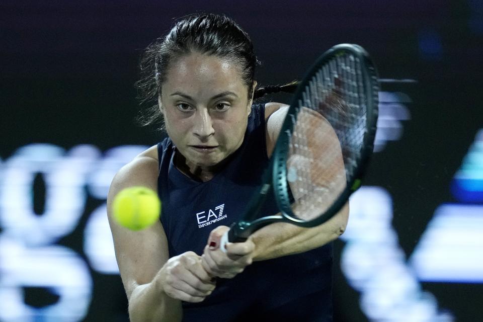 Elisabetta Cocciaretto of Italy returns the ball to Coco Gauff of the U.S. during a match of the Dubai Duty Free Tennis Championships in Dubai, United Arab Emirates, Monday, Feb. 19, 2024. (AP Photo/Kamran Jebreili)