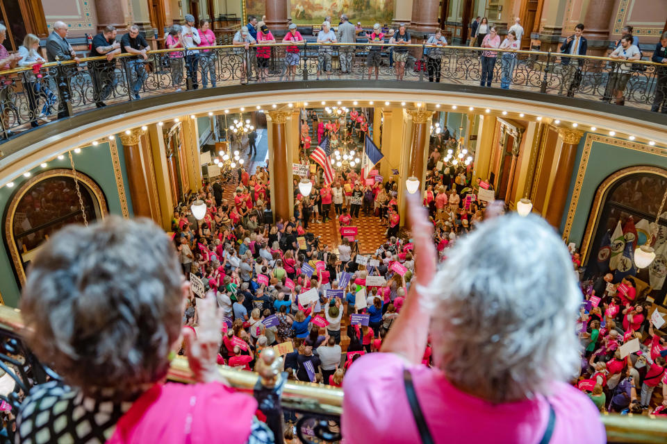 Protesters rally for reproductive rights in the Iowa State Capitol rotunda on July 11, 2023. (Zach Boyden-Holmes / Zach Boyden-Holmes/The Register )