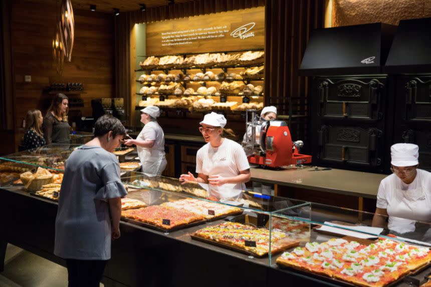 Visitors shop a range of fresh-baked goods at Princi, the new Starbucks-owned bakery and cafe in Seattle. (Photo: Starbucks)