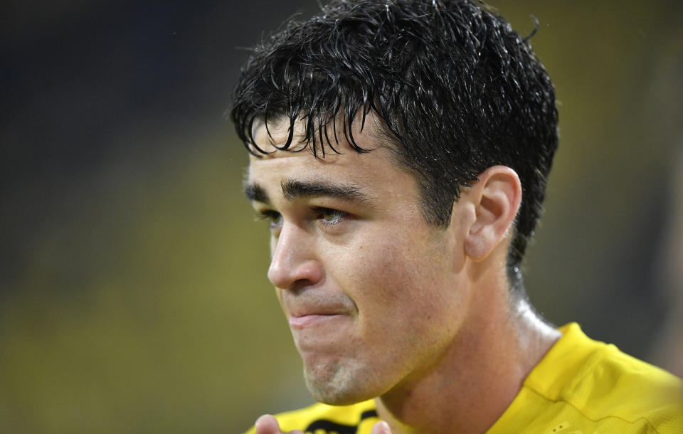 FILE - This Oct., 3, 2020, file photo shows Dortmund's Giovanni Reyna watching during the German Bundesliga soccer match between Borussia Dortmund and SC Freiburg in Dortmund, Germany. Gio Reyna, a son of former U.S. captain Claudio Reyna, got his first call-up to the U.S. national soccer team. The Borussia Dortmund midfielder is part of a 24-man roster for exhibitions at Wales on Nov. 12 and against Panama four days later in Austria. (AP Photo/Martin Meissner, File)