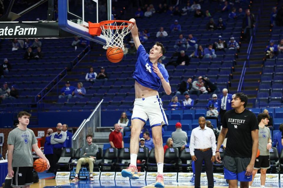 Kentucky men’s basketball freshman center Zvonimir Ivisic dunks the ball during pregame warmups prior to a game against Georgia at Rupp Arena in Lexington, Ky, Saturday, January 20, 2024. Ivisic is a 7-foot-2 freshman center from Croatia.