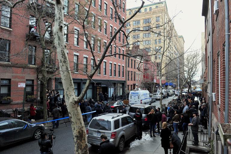 The scene outside the apartment building of US actor Philip Seymour Hoffman after he was reported dead on February 2, 2014 in the Greenwich Village area of New York