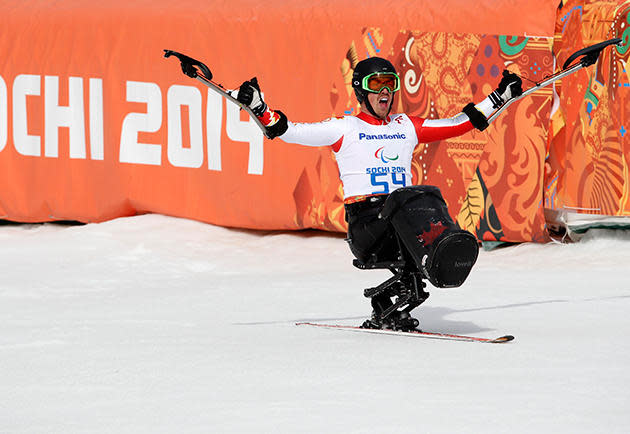 <div>JOYOUS - <span>Canada's Josh Dueck reacts in the finish area during the men's sitting skiing downhill at the 2014 Sochi Paralympic Winter Games at the Rosa Khutor Alpine Center.</span></div>