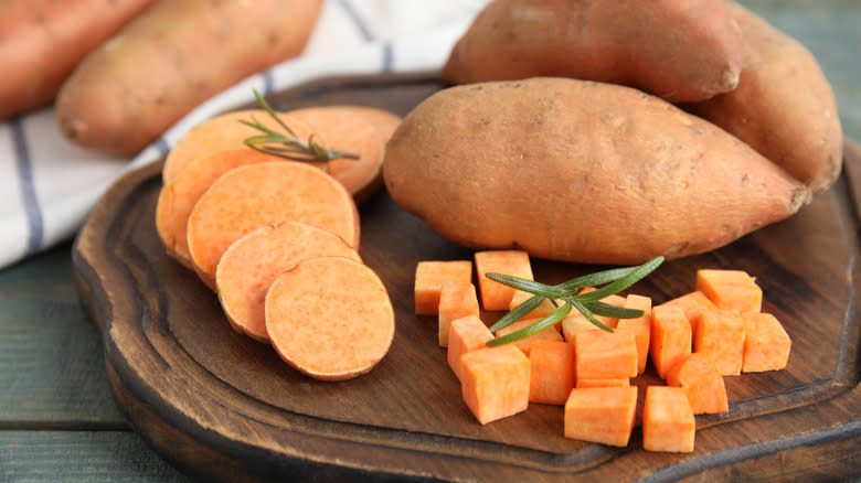 Sweet potatoes on cutting board