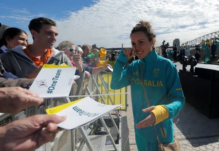 Australia's modern pentathlete gold medallist Chloe Esposito prepares to sign autographs for fans during an official welcome home for Australia's Olympic athletes back returning from Rio at the Sydney Opera House in Australia, August 29, 2016. REUTERS/Jason Reed