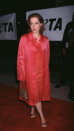 <p> Anderson has been making bold fashion choices since the start of her career. The actress looked pretty in an all-pink ensemble at the PETA Party of the Century and the Humanitarian Awards, held in Los Angeles in 1999. She layered a coat over a matching midi dress and added a touch of sparkle with her handbag. It's probably not a look we'd recreate now, but the oversized fit, crushed silk material and strappy heels were definitely of the time. </p>