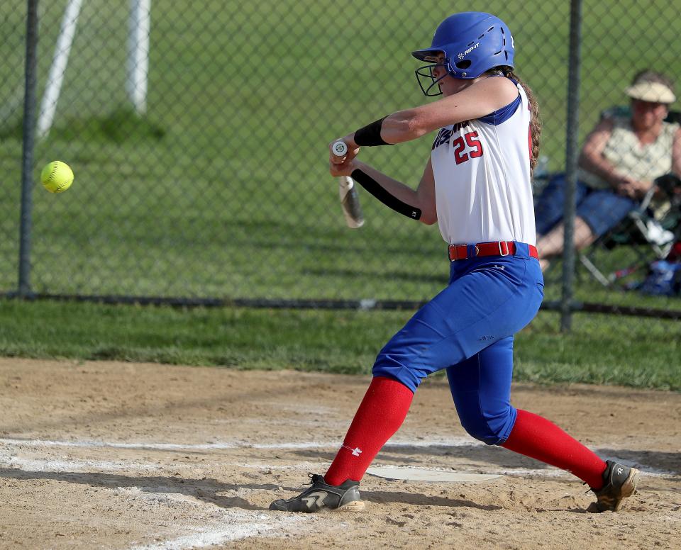 Meredith Rankl hits a solo home run in the third inning against Black River in their Division III district final at Norwayne High School Thursday, May 20, 2021.