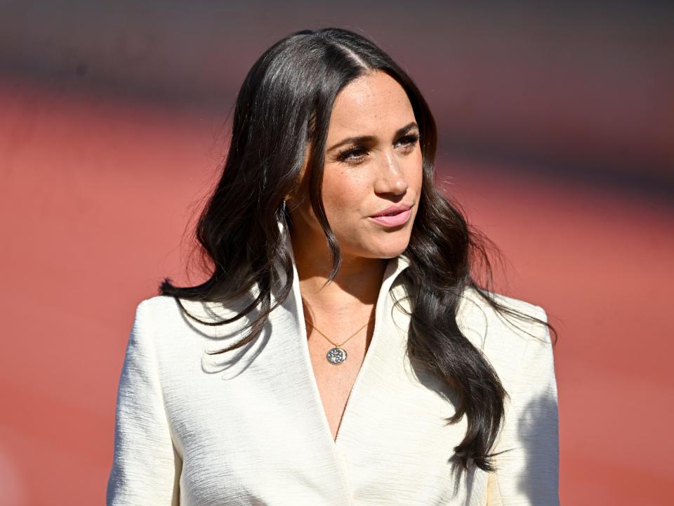 Meghan Markle in a white jacket